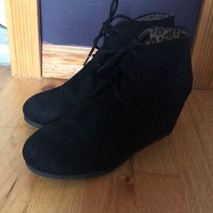 Black wedge booties
